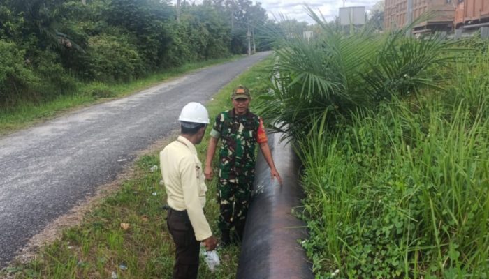 Babinsa Bagan Besar Gelar Patroli Keamanan Wilayah Pipa Minyak