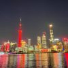 Oriental Pearl and Shanghai Tower, together with towers around the world, light up in red in celebration of the Spring Festival of the Year of the Snake