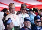 Semarak Pestival Pacu Jalur tradisional, Bupati Bengkalis Hadir Kenakan Baju Melayu Lengkap